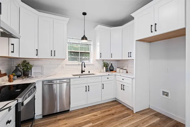a view of a dining room with furniture and window