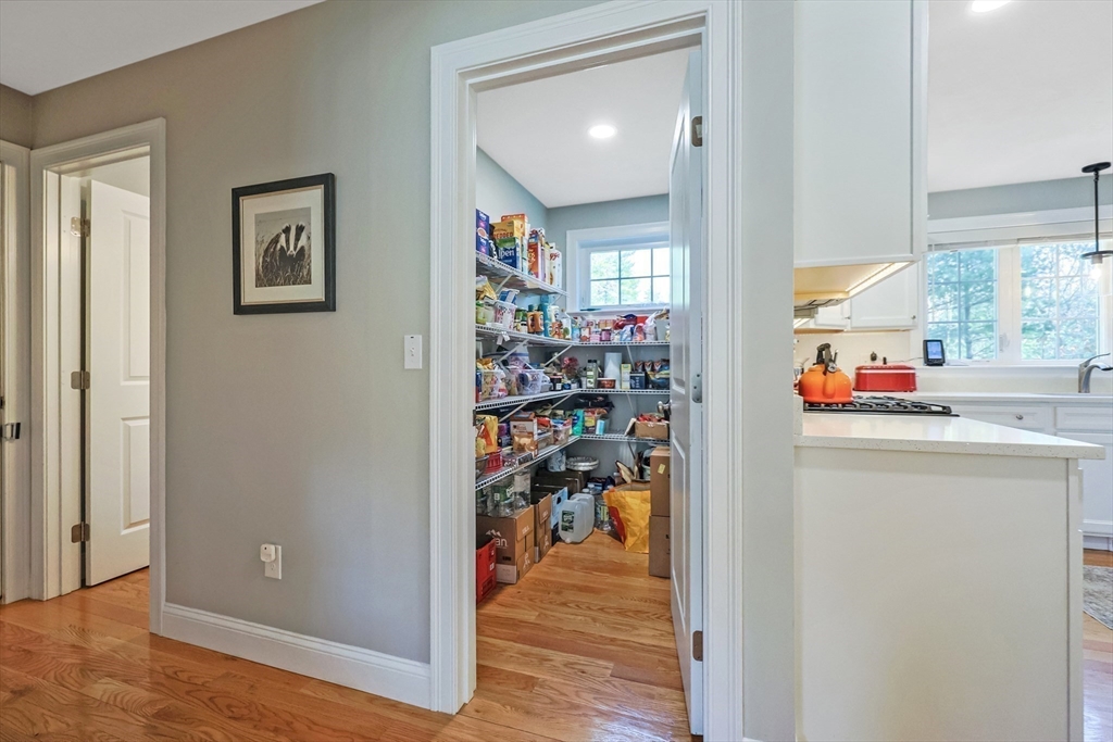 27 Paddock Circle Middleboro, MA 02346 - Photo 11 of 35 a view of a hallway with dining area wooden floor and a window