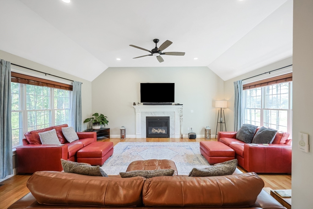 27 Paddock Circle Middleboro, MA 02346 - Photo 14 of 35 a living room with furniture and a fireplace