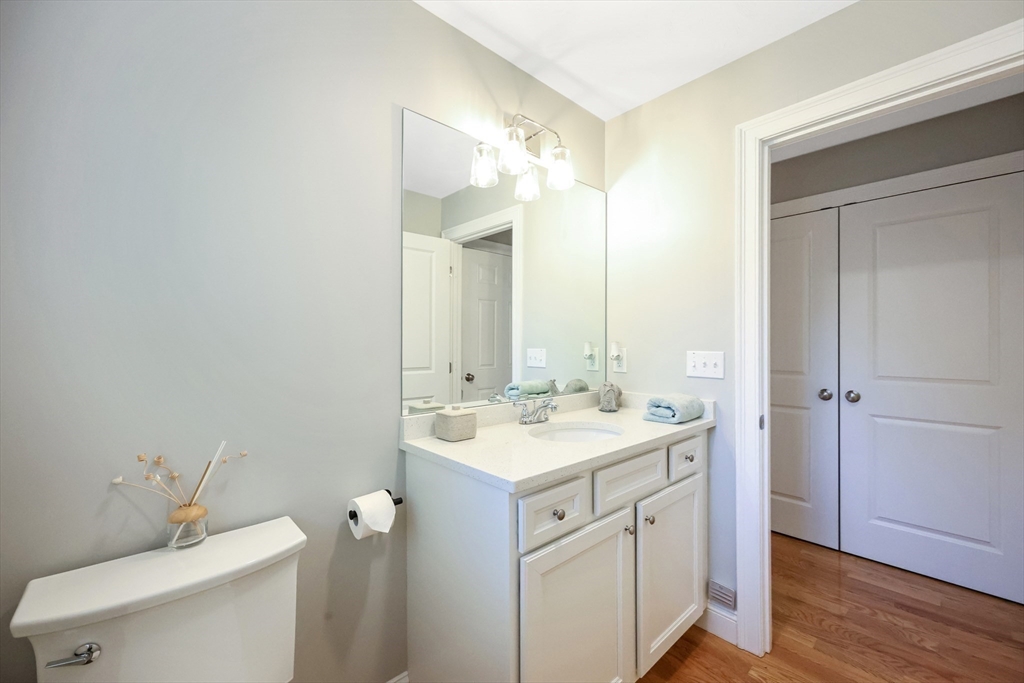 27 Paddock Circle Middleboro, MA 02346 - Photo 16 of 35 a bathroom with a sink toilet and vanity