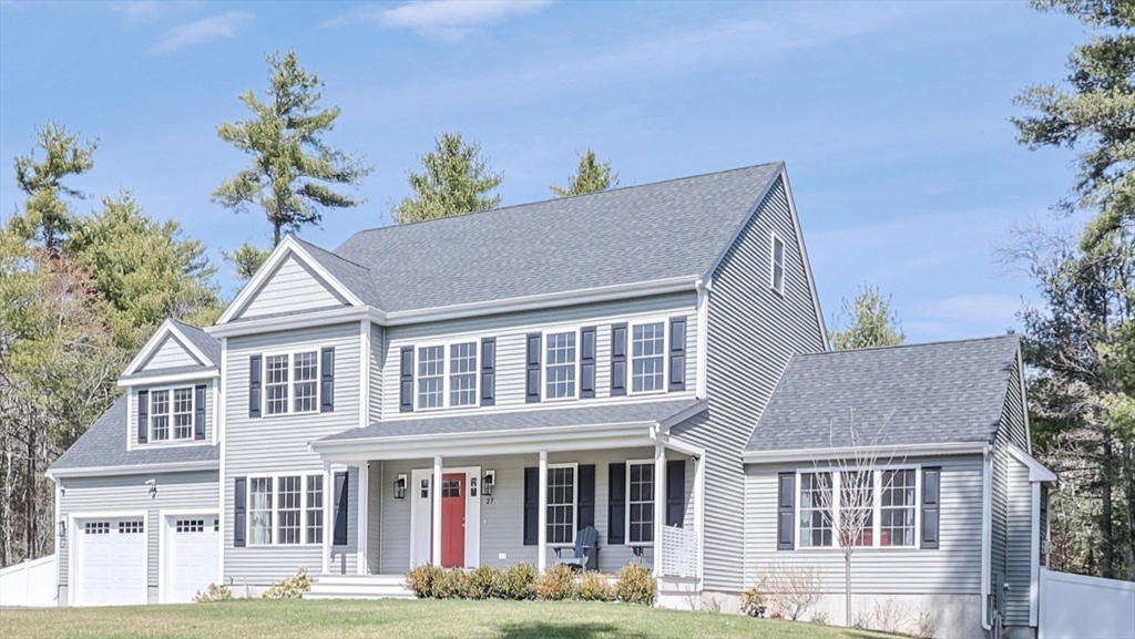 27 Paddock Circle Middleboro, MA 02346 - Photo 2 of 35 a house view with a garden space