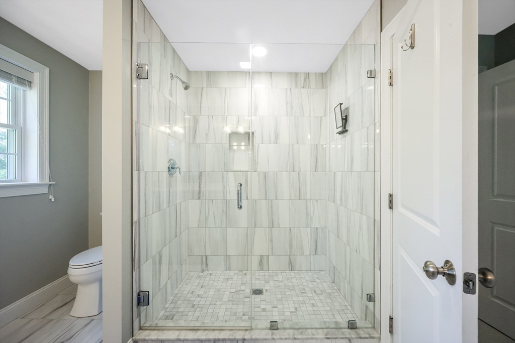 27 Paddock Circle Middleboro, MA 02346 - Photo 22 of 35 a bathroom with a shower and a toilet