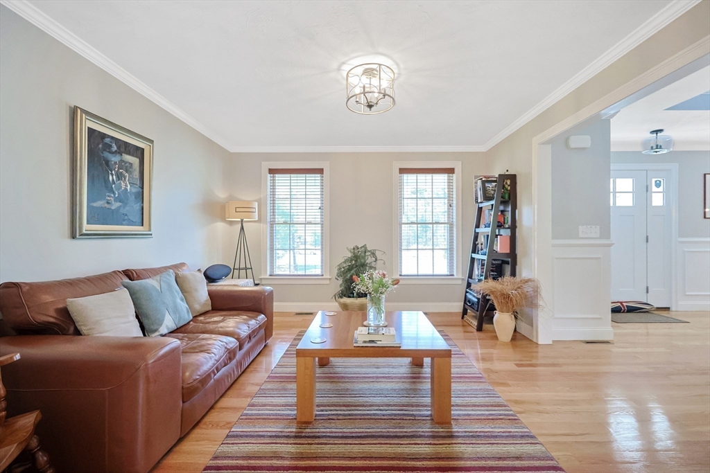 27 Paddock Circle Middleboro, MA 02346 - Photo 6 of 35 a living room with furniture and wooden floor