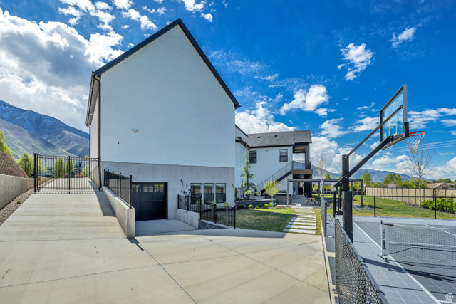 1720 Hillcrest Circle Mapleton, UT 84664 - Photo 96 of 116 View of sport court featuring a mountain view, a gate, and basketball court