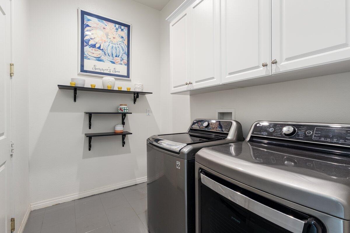 44027 Triolo Way Indio, CA 92203 - Photo 13 of 17 a view of appliances and cabinets