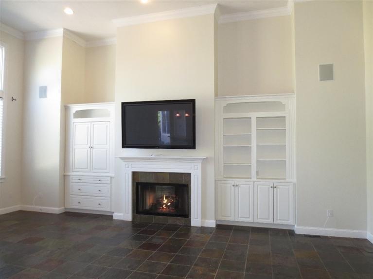 36 Open Space Drive Sandwich, MA 02563 - Photo 17 of 35 a living room with a fireplace