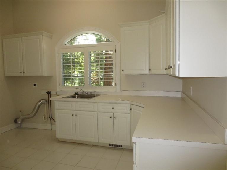 36 Open Space Drive Sandwich, MA 02563 - Photo 18 of 35 a view of a kitchen with granite countertop cabinets
