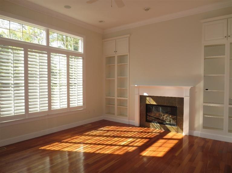 36 Open Space Drive Sandwich, MA 02563 - Photo 19 of 35 a bedroom with a bed and a fireplace
