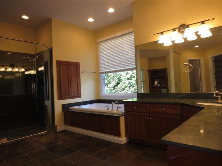 36 Open Space Drive Sandwich, MA 02563 - Photo 24 of 35 a kitchen with a sink and large window