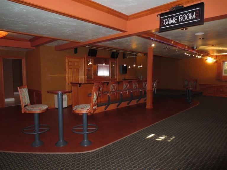 36 Open Space Drive Sandwich, MA 02563 - Photo 28 of 35 a view of a chairs and table on the wooden floor