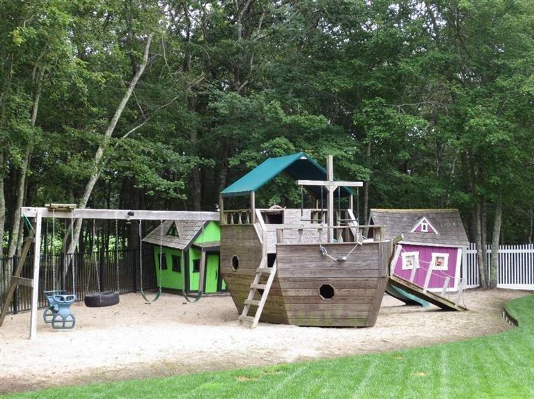 36 Open Space Drive Sandwich, MA 02563 - Photo 7 of 35 an aerial view of a house with backyard space and balcony