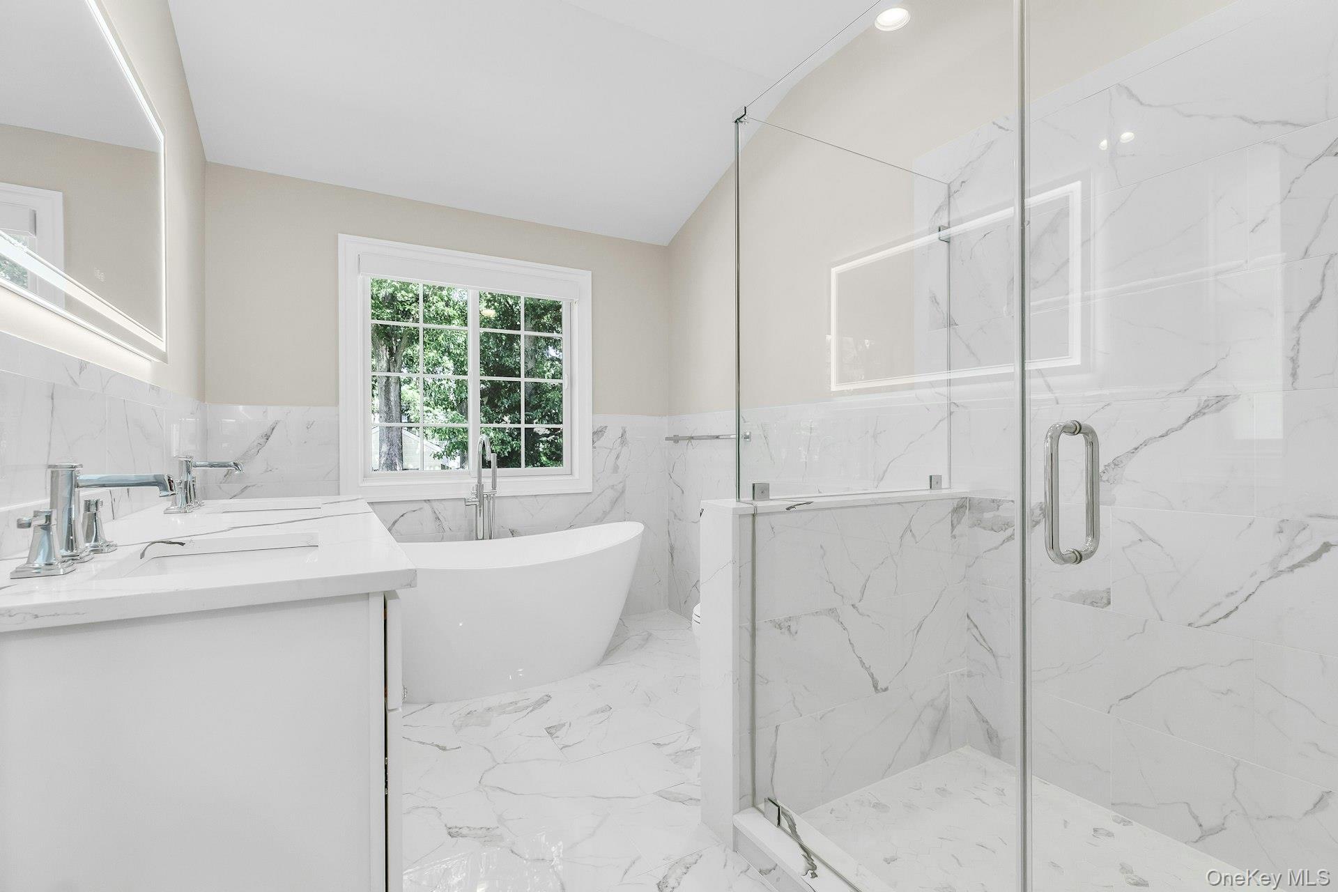 9 Hickory Road Bayville, NY 11709 - Photo 13 of 30 Custom primary spa, large walk-in shower and soaking tub, custom tiles.