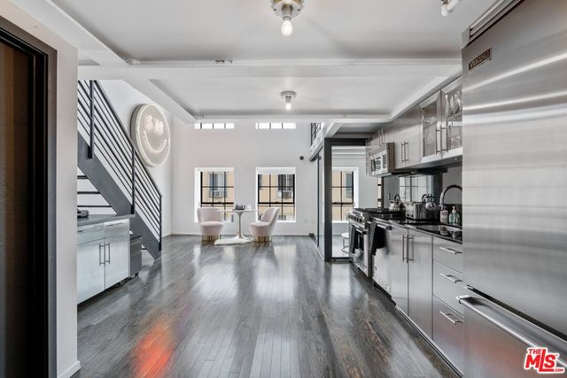 wooden floor in kitchen and a living room with wooden floor