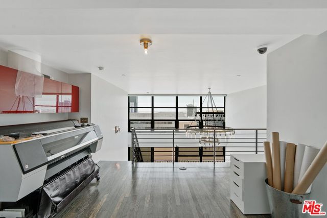 a view of livingroom with furniture and flat screen tv