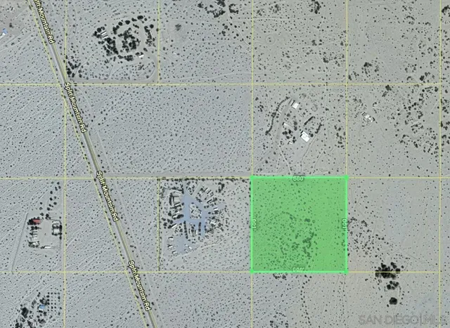 an aerial view of beach and city