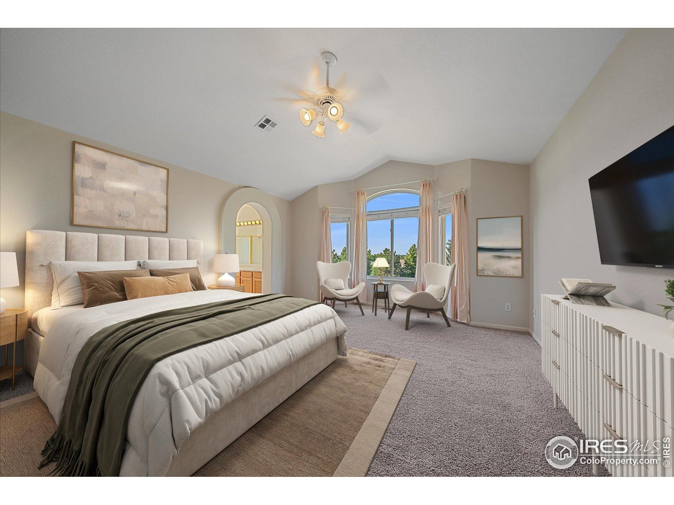 1320 West 12th Avenue Broomfield, CO 80020 - Photo 21 of 50 a living room with furniture and a flat screen tv