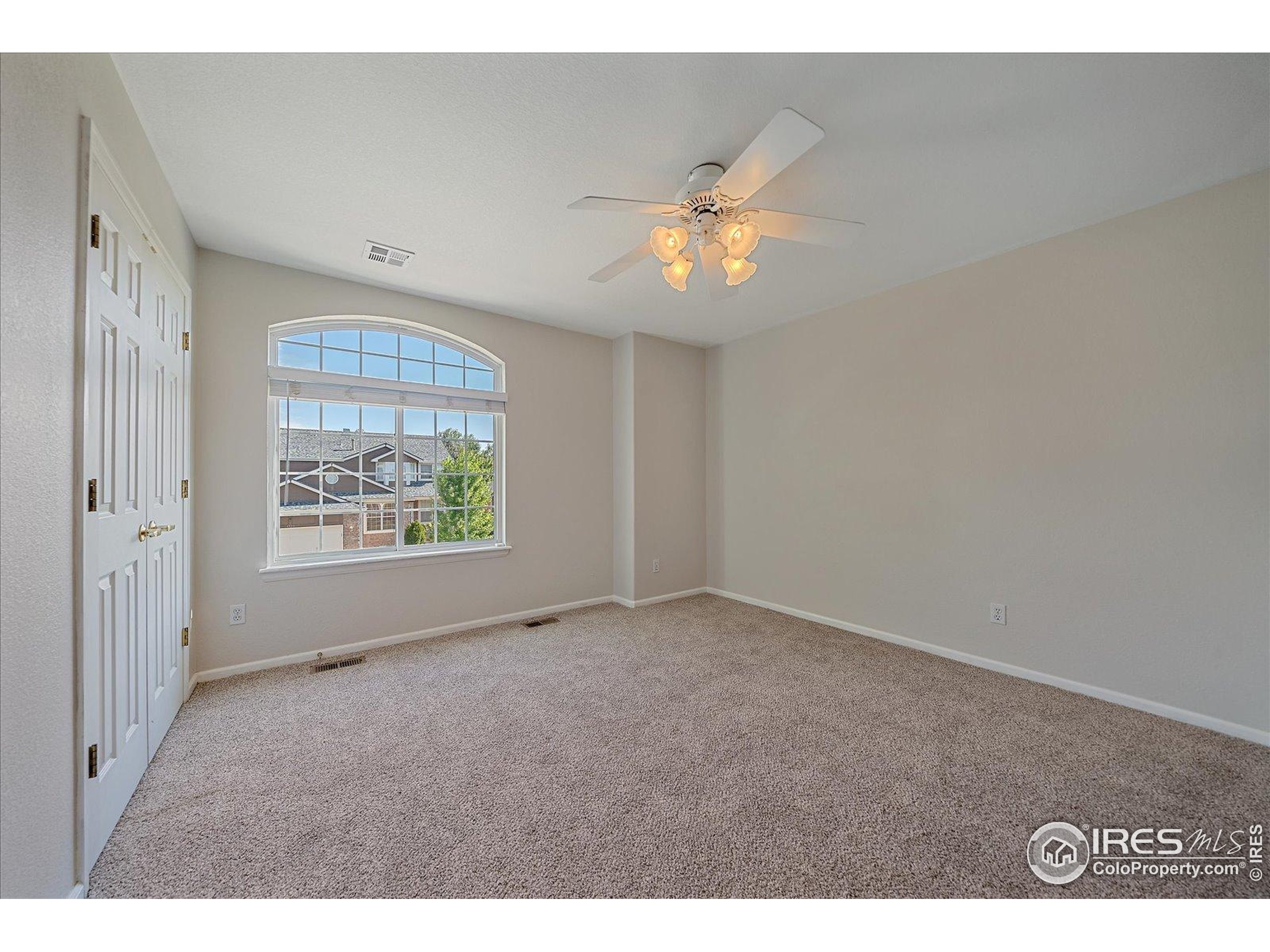 1320 West 12th Avenue Broomfield, CO 80020 - Photo 26 of 50 a view of an empty room with a window