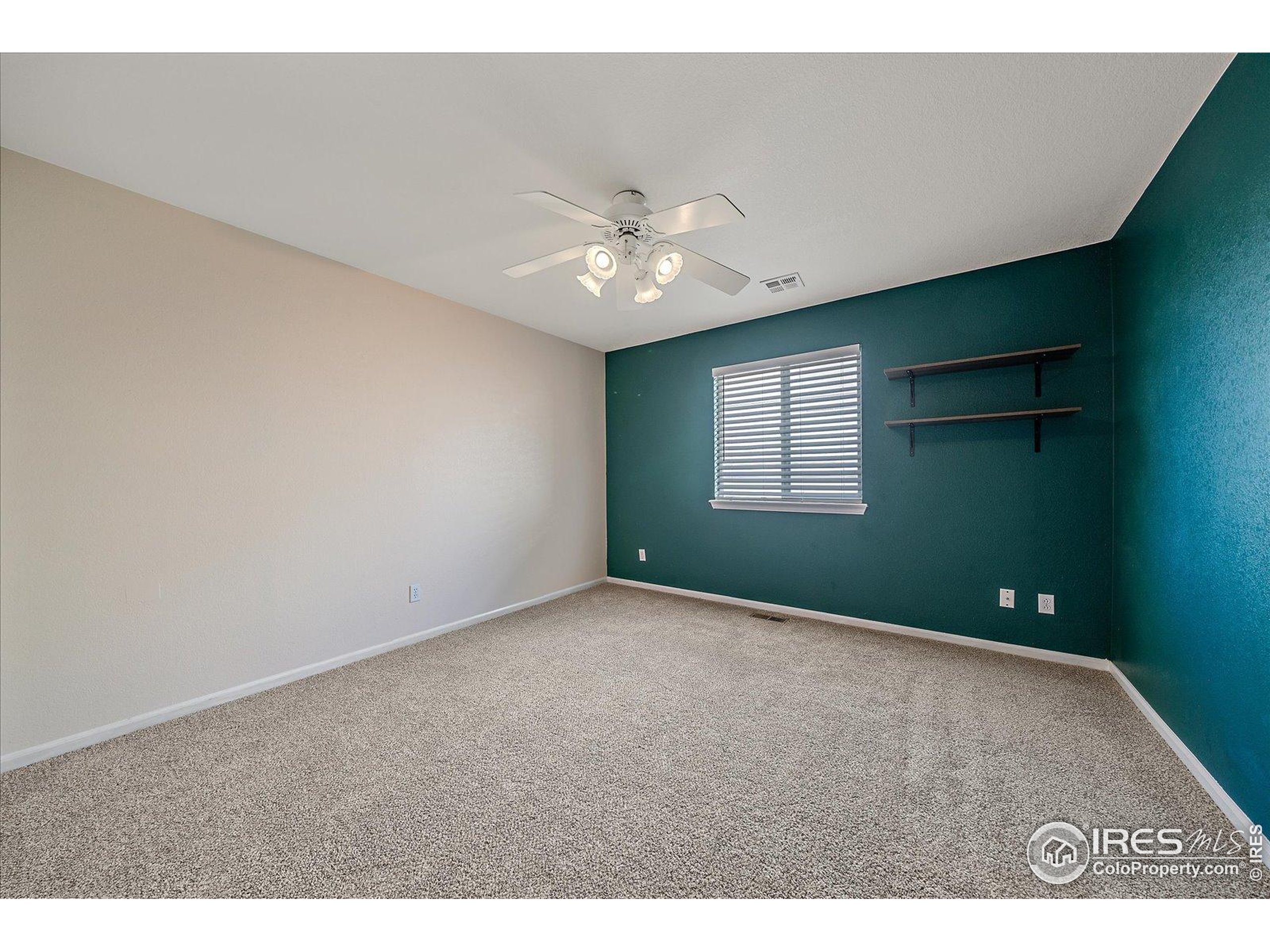 1320 West 12th Avenue Broomfield, CO 80020 - Photo 27 of 50 a view of an empty room with a window