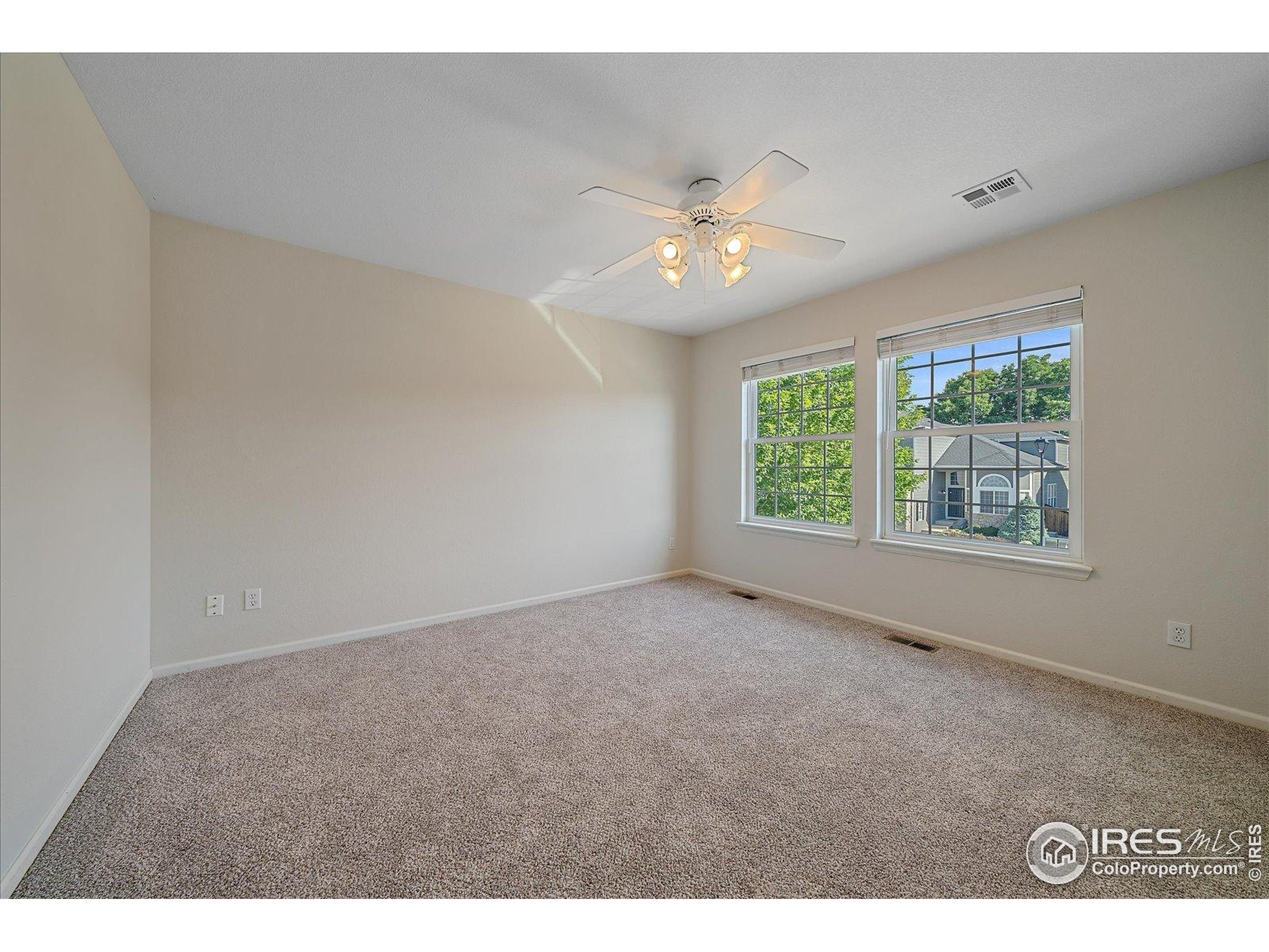 1320 West 12th Avenue Broomfield, CO 80020 - Photo 28 of 50 a view of an empty room with a window
