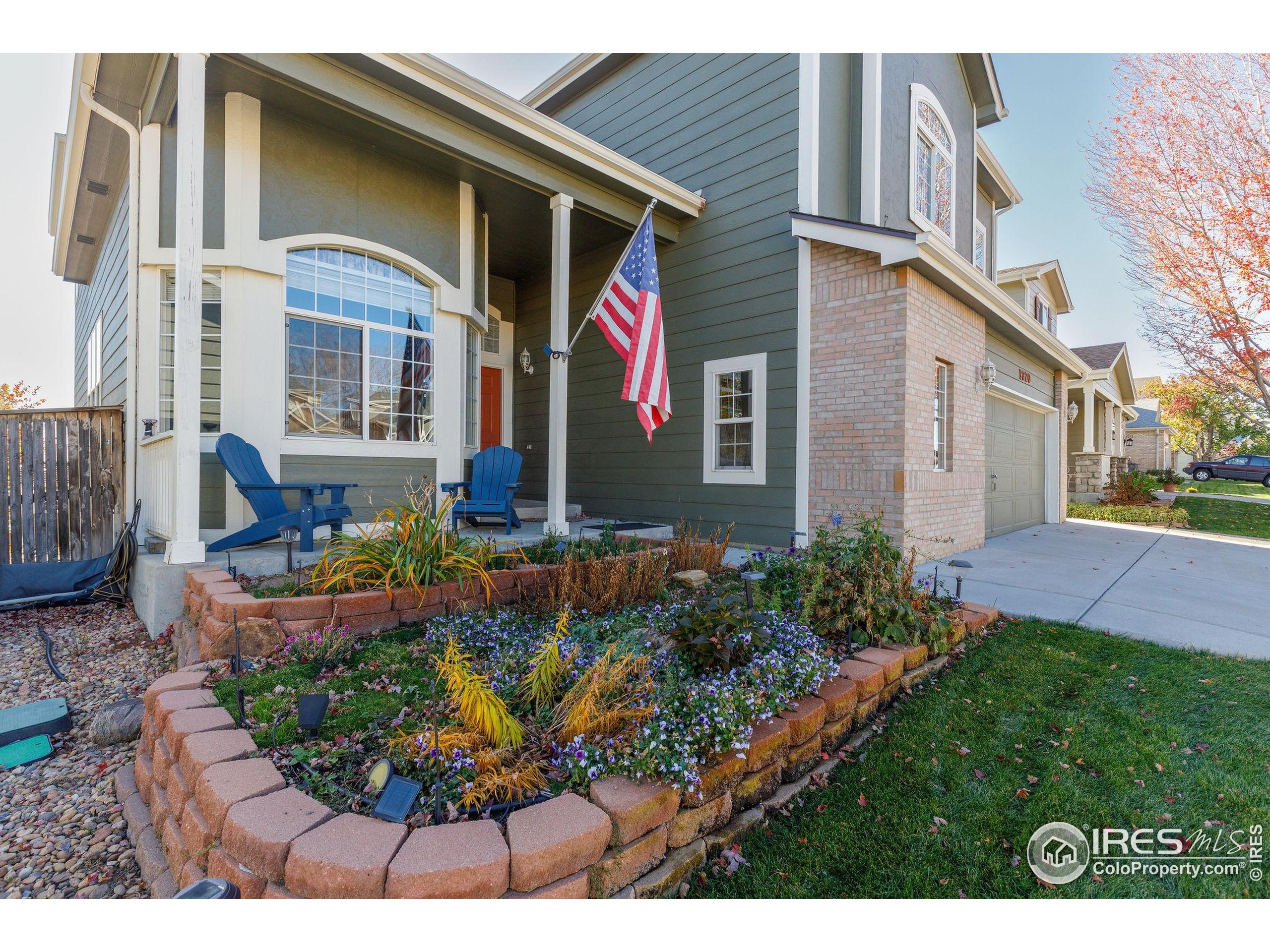 1320 West 12th Avenue Broomfield, CO 80020 - Photo 3 of 50 a view of a house with many windows