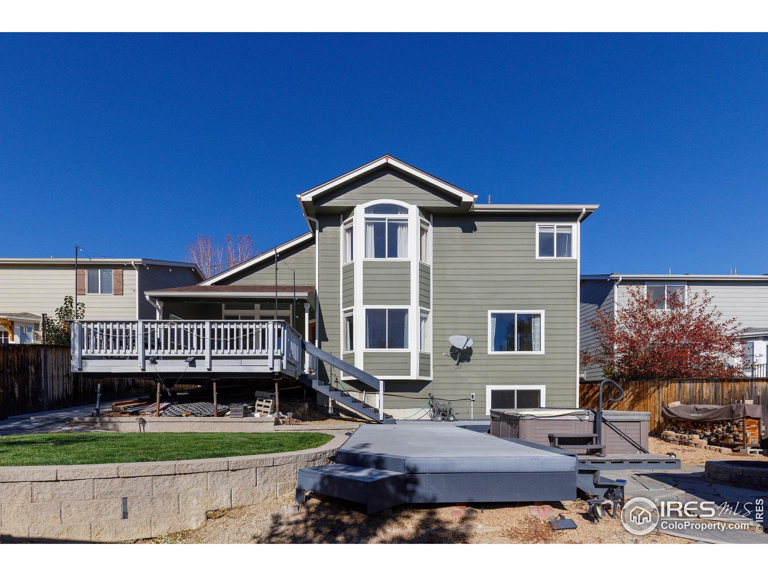 1320 West 12th Avenue Broomfield, CO 80020 - Photo 40 of 50 a front view of a house with a yard