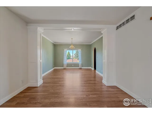 a view of an empty room and window