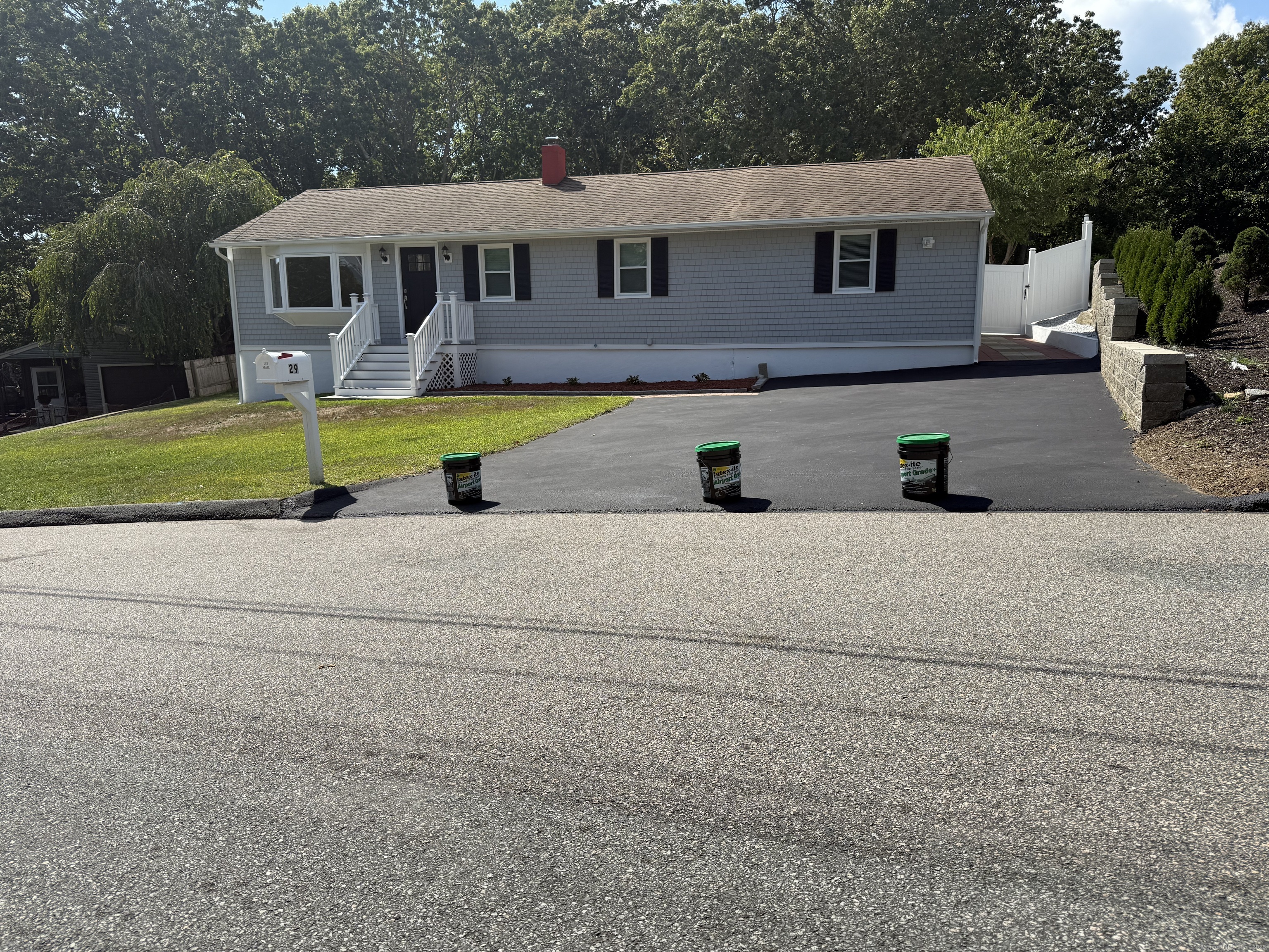 29 Blueberry Hill Road Groton, CT 06340 - Photo 4 of 29 a house that has a big yard