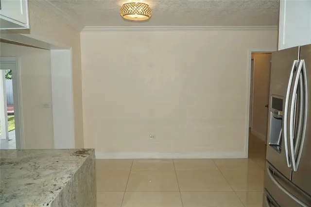 a view of a kitchen with a sink