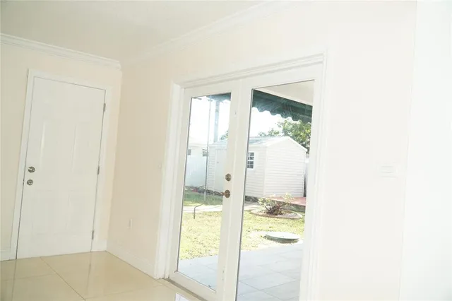 a view of a bathroom with a glass door