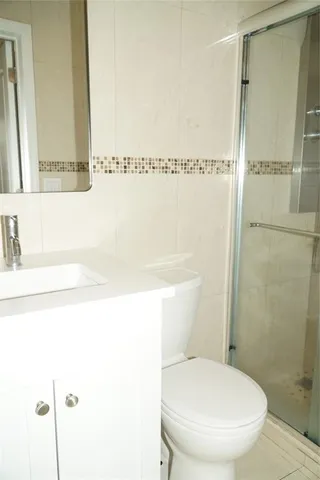 a bathroom with a toilet and a sink