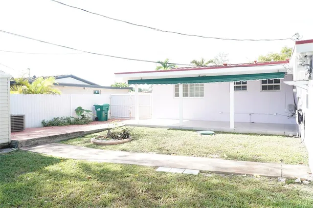 a view of a house with a swimming pool