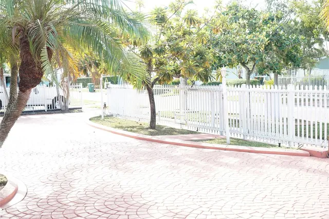 a view of a backyard of the house