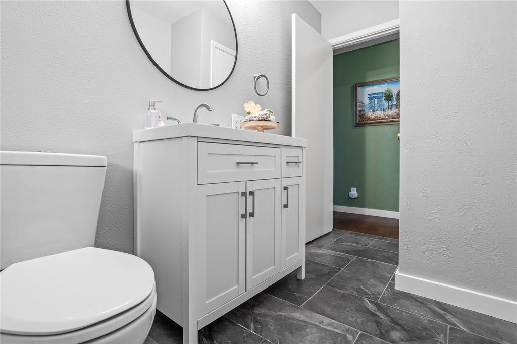 435 Hanbee Street Richardson, TX 75080 - Photo 25 of 36 Bathroom with uppdated vanity.