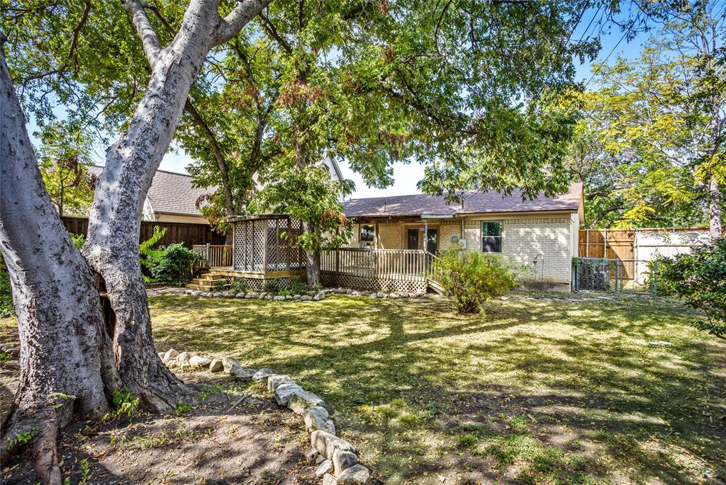 435 Hanbee Street Richardson, TX 75080 - Photo 29 of 36 Back of house featuring a deck, a fenced backyard, an huge spectacular deck.