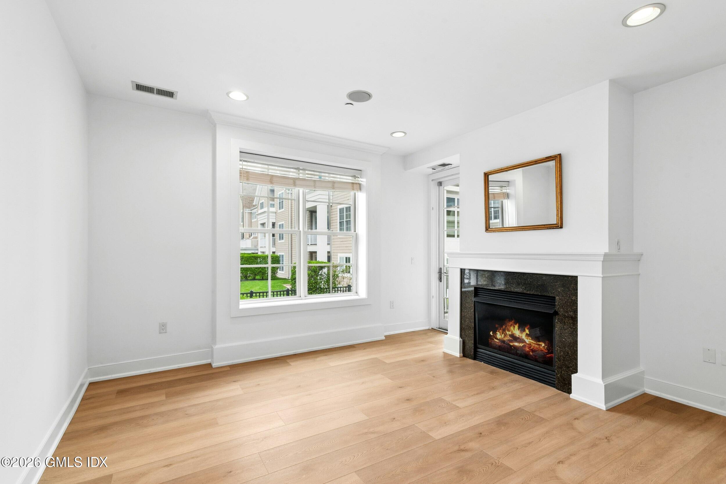 77 Havemeyer Lane, Unit 310 Stamford, CT 06902 - Photo 9 of 24 Living room area
