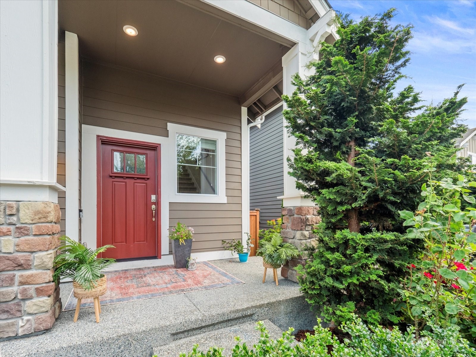 17307 39th Drive Southeast Bothell, WA 98012 - Photo 3 of 40 a front view of a house with a yard
