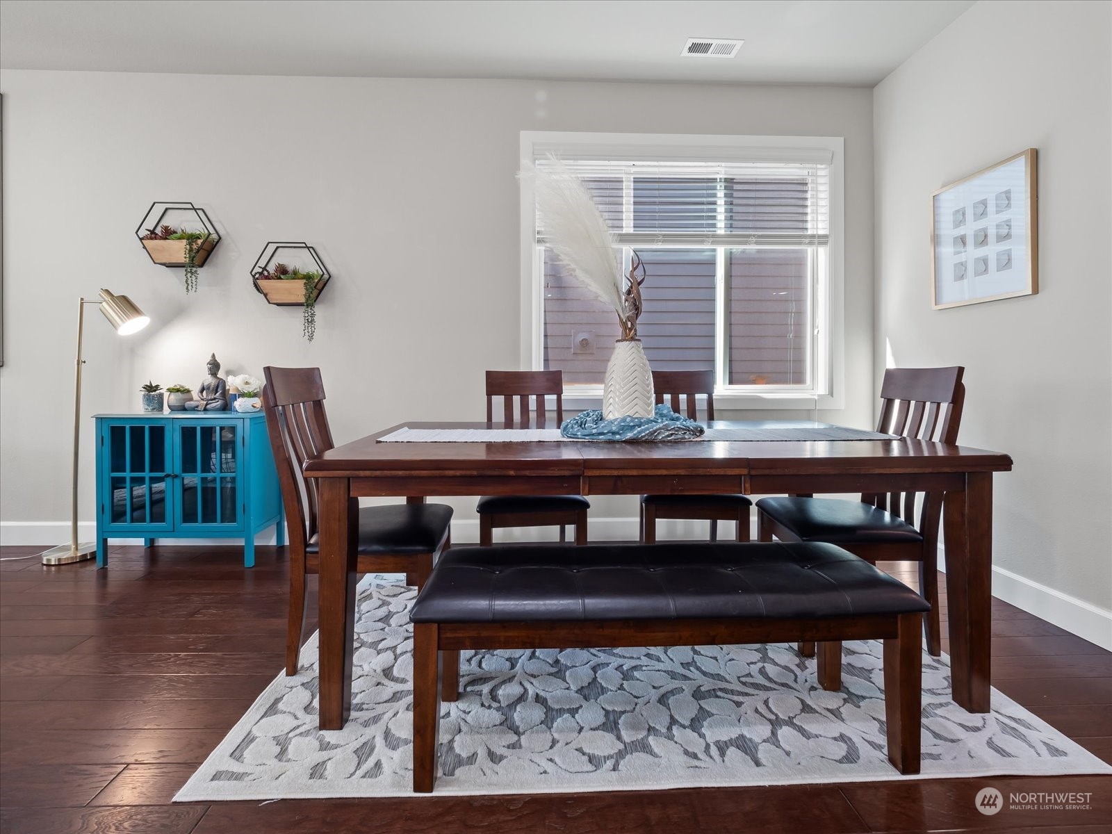17307 39th Drive Southeast Bothell, WA 98012 - Photo 7 of 40 a view of a dining room with furniture and wooden floor
