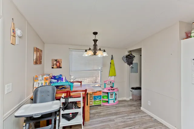 a children room with furniture and toys