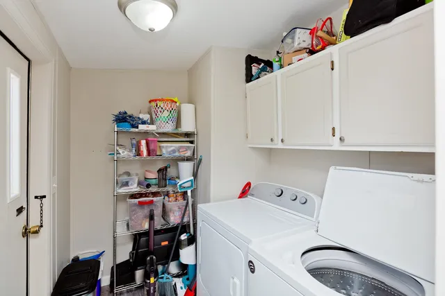 a storage room with washer and dryer