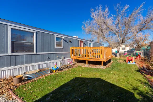a garden with wooden fence