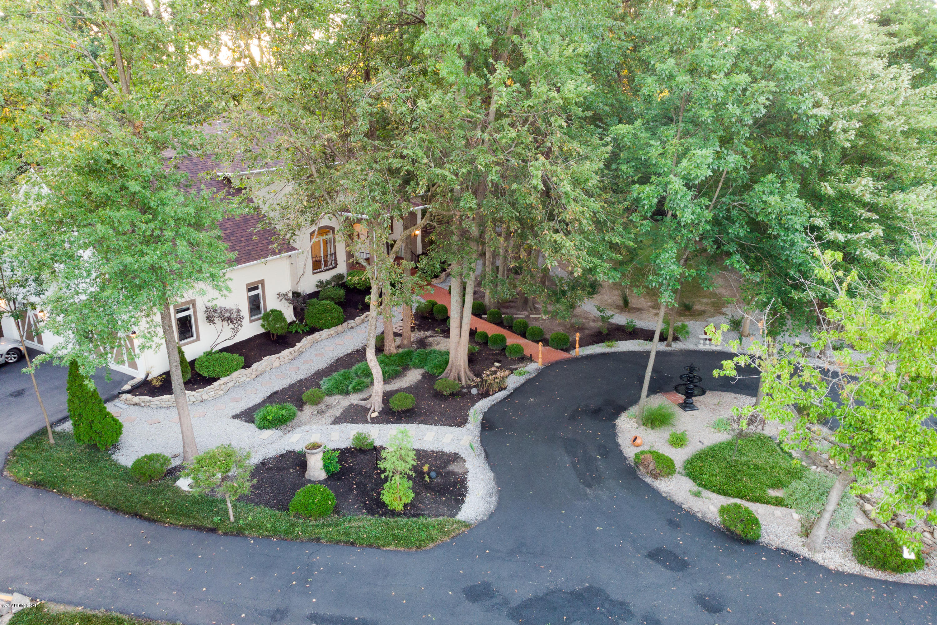 11511 Cedardale Road Anchorage, KY 40223 - Photo 99 of 99 Positioned on a quiet cul de sac and meticulously landscaped 1.2 acre, 2-Story Mediterranean-style brick home