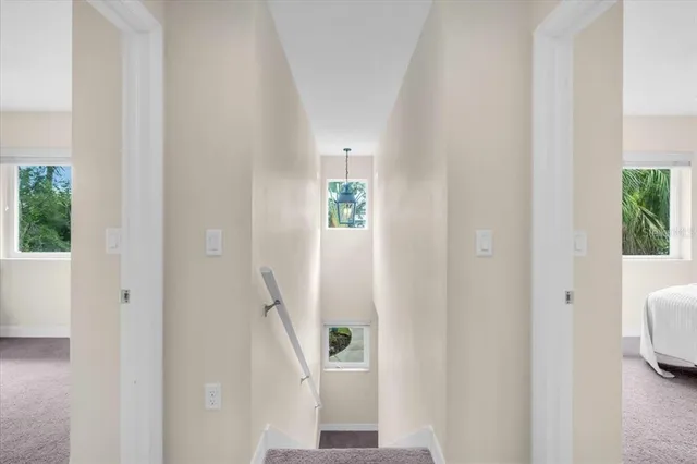 a view of a bedroom from the hallway