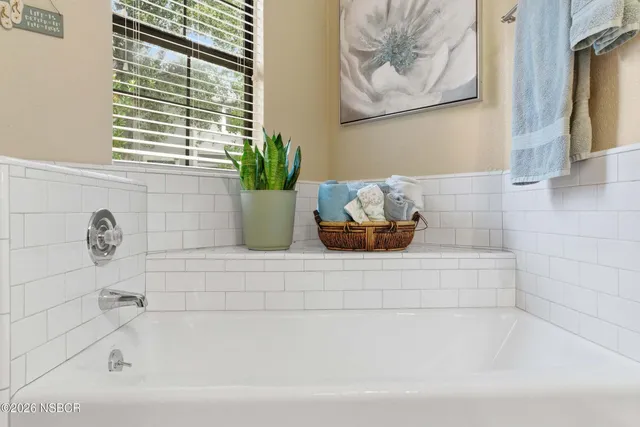 a bathroom with a bathtub