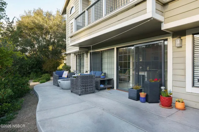 a building outdoor space with furniture and garden