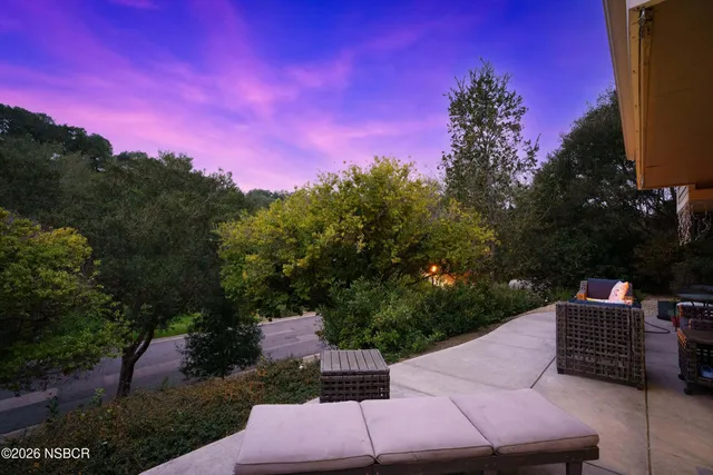 a view of a yard with an outdoor space
