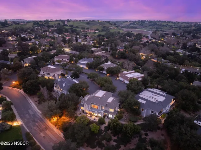a view of a city with a mountain in the background