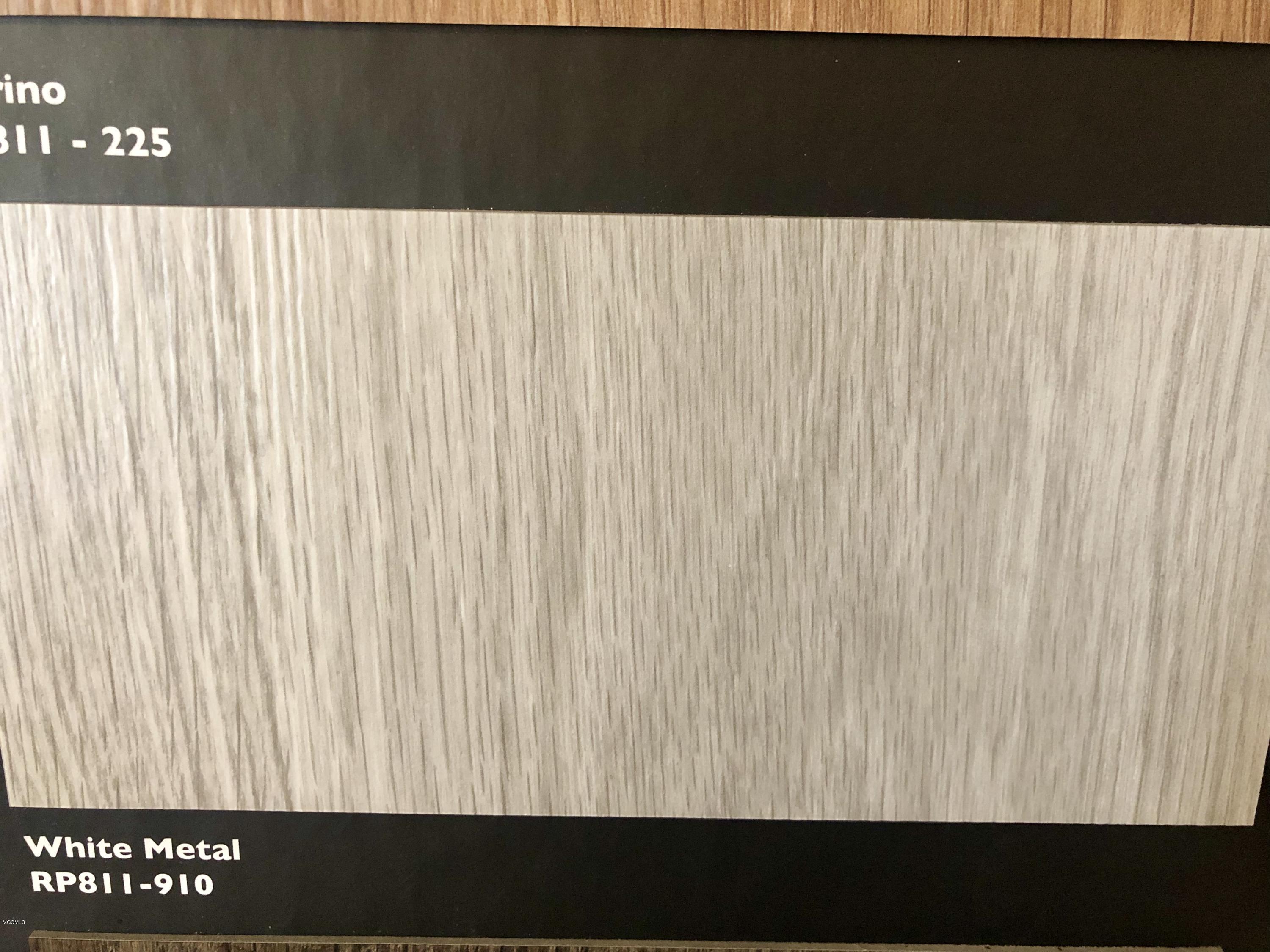 6864 Biddix Evans Road Ocean Springs, MS 39564 - Photo 5 of 8 Durable waterproof plank flooring