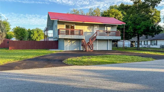 a view of a house with a swimming pool