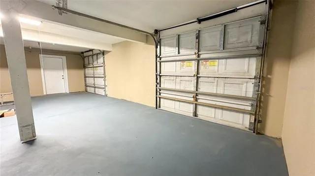 a view of empty room with windows