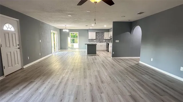 a view of an empty room and window